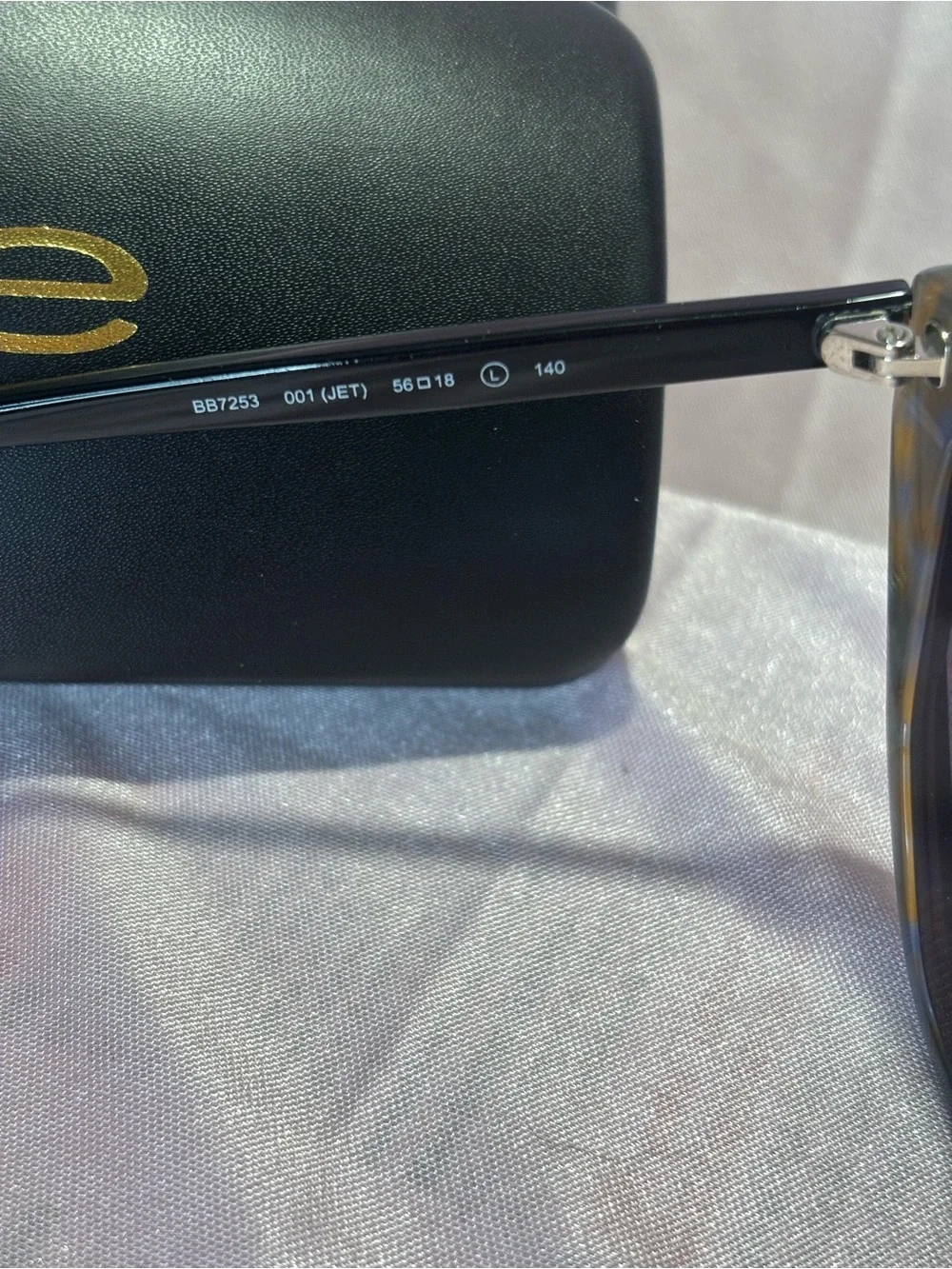 BEBE Black Tortoise Cat-Eye Sunglasses with Dark Lenses